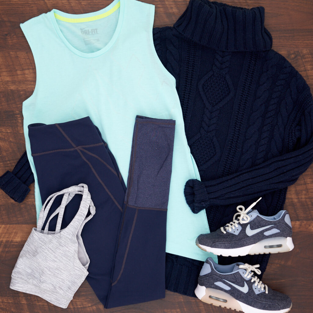 Athletic wear outfit with Athleta chaturanga tights, Lululemon sports bra, Nike tank, Athleta wool sweater and Nike sneakers in blue