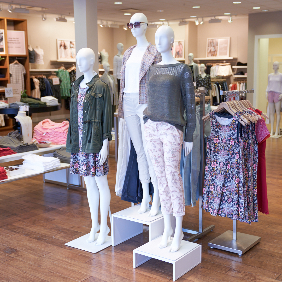 Mannequins right in front of the doors of the store