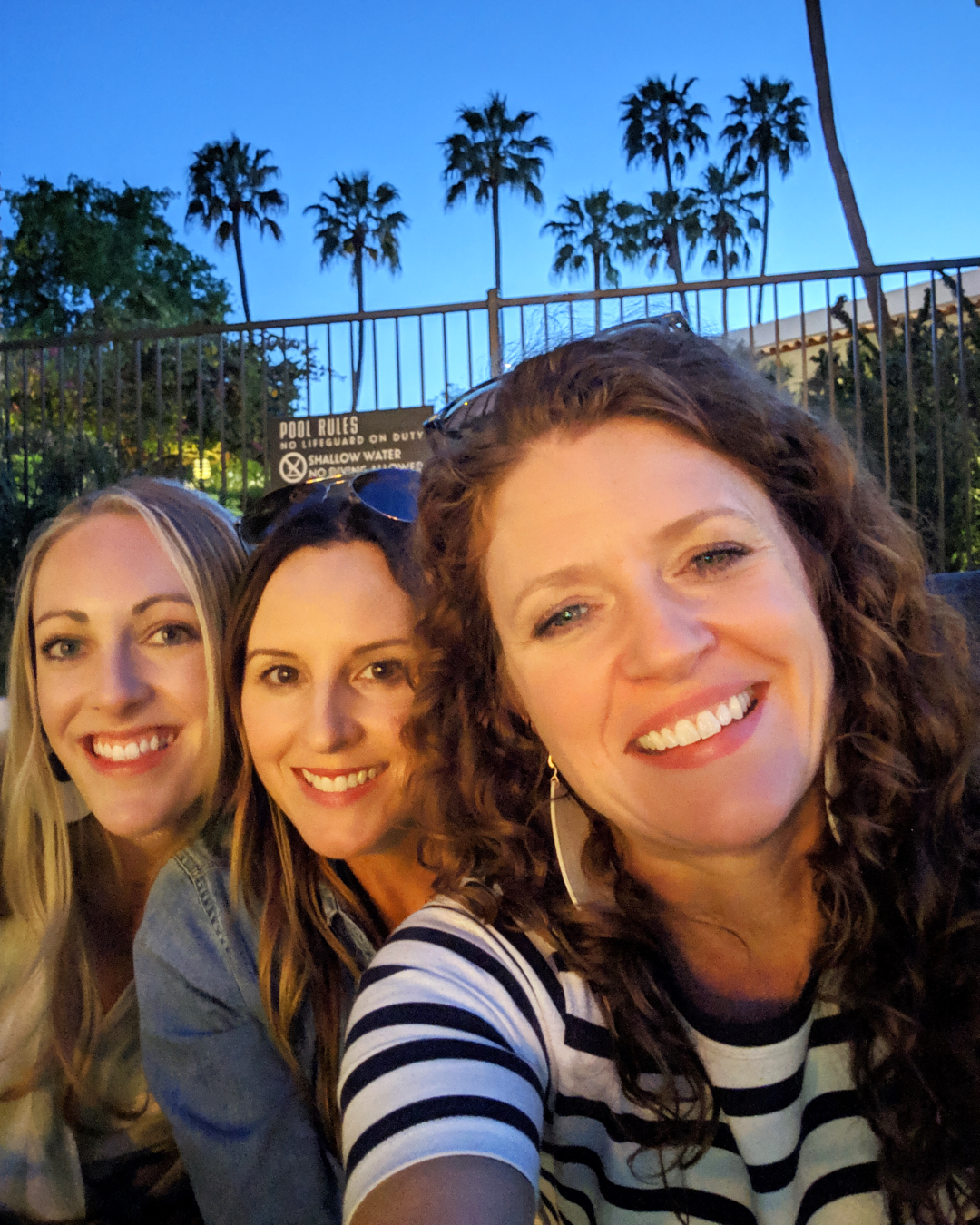 Selfie of all three of us at the pool at the Scott in the evening