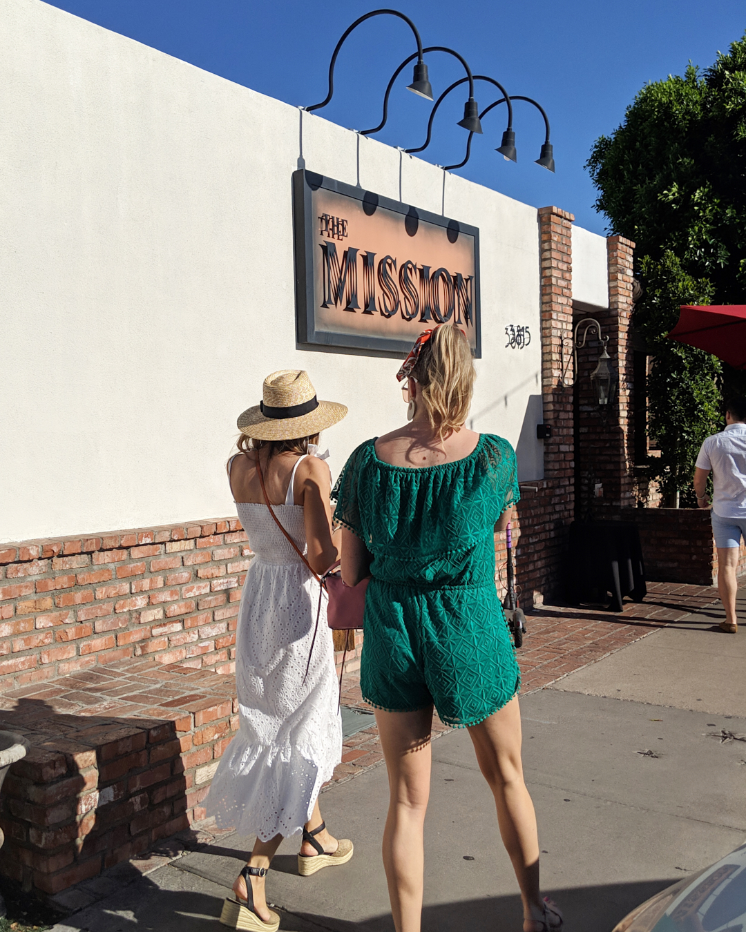 Erika and Jennifer walking outside of the Mission Restaurant